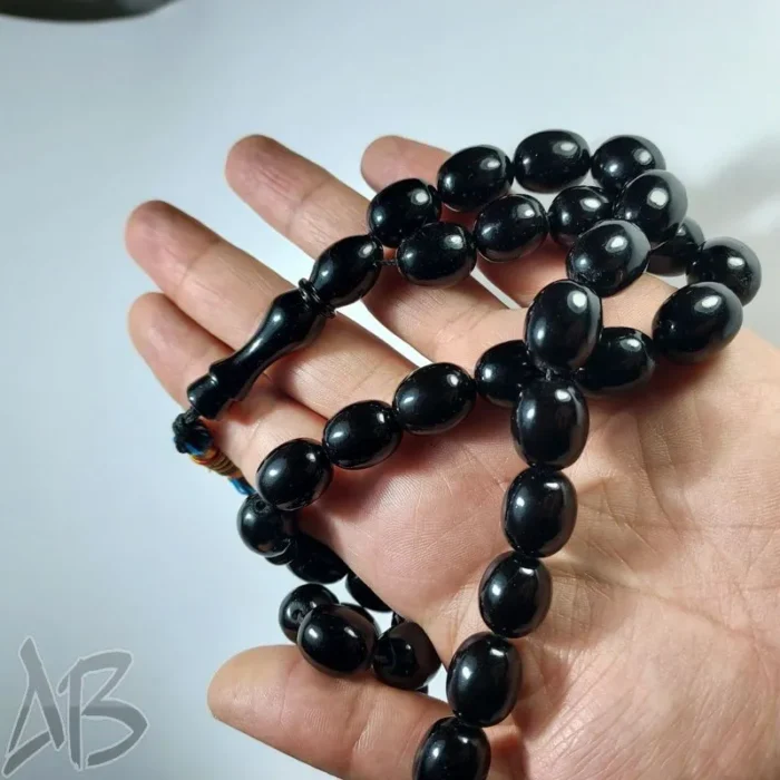 تسبیح سندلوس 33 دانه بودار تراش بیضی سیاه بسیار زیبا کد 888 آقابزرگ - Image 5