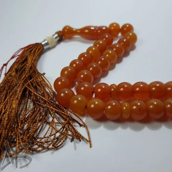 تسبیح سندلوس 33 دانه بودار تراش شلغمی رنگ عقیق سرخ خوش تراش کد 825 آقابزرگ - Image 5