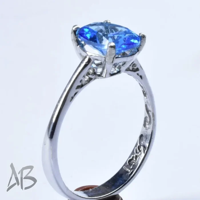 انگشتر نقره زنانه اصل نگین توپاز درخشان و ركاب ساده و سبك کد 667 - Image 7