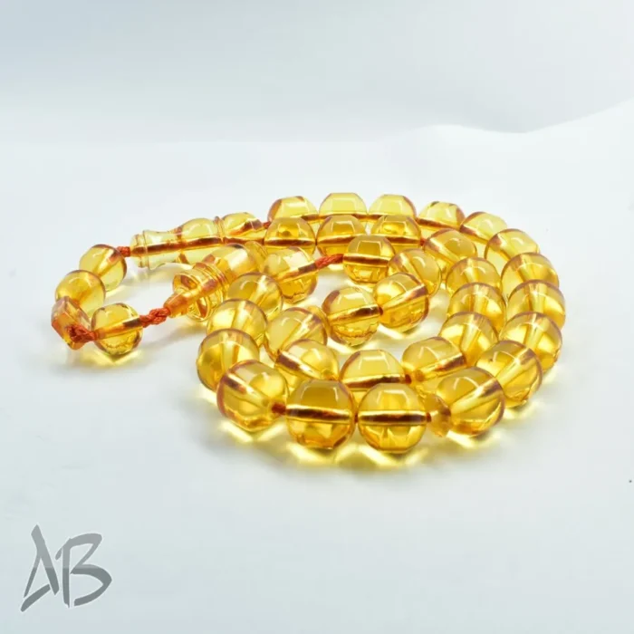 تسبیح سندلوس بودار 33 دانه اصل کد 1155 تراش دوکی قپان دار زرد خوشدست و زیبا آقابزرگ - Image 4