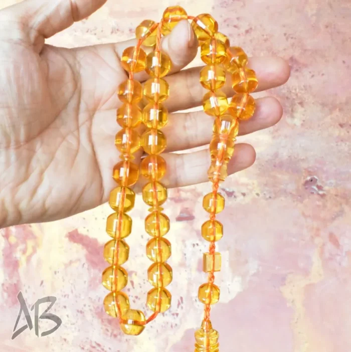 تسبیح سندلوس بودار 33 دانه اصل کد 1155 تراش دوکی قپان دار زرد خوشدست و زیبا آقابزرگ - Image 7