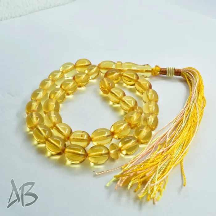تسبیح سندلوس 33 دانه اصل بودار کد 1156 تراش تخم‌مرغی زرد شفاف آقابزرگ - Image 5