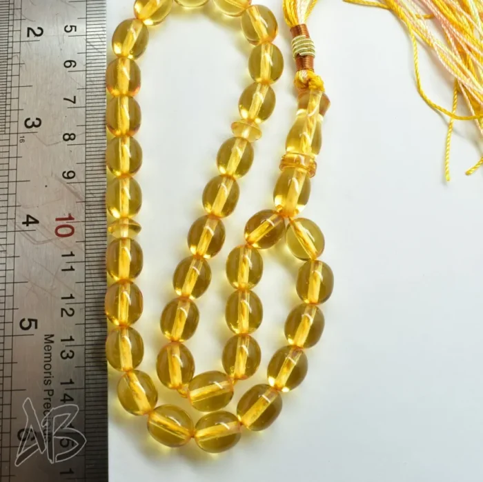 تسبیح سندلوس 33 دانه اصل بودار کد 1156 تراش تخم‌مرغی زرد شفاف آقابزرگ - Image 7