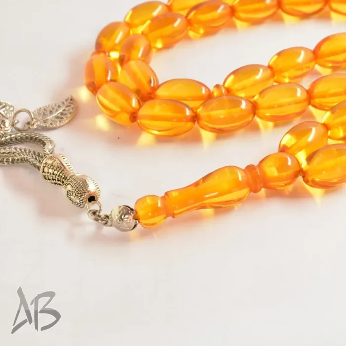 تسبیح سندلوس 41 دانه بودار تراش خربزه‌ای کشیده با منگوله بسیار زیبا کد 1159 آقابزرگ - Image 4