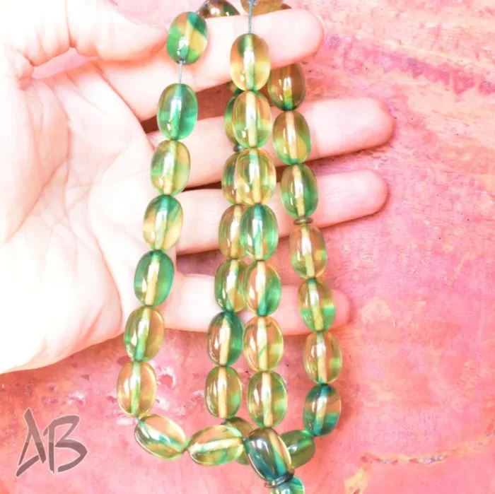 تسبیح کهربای 35 دانه بیضی کشیده رگه‌دار بسیار شکیل کد 1163 آقابزرگ - Image 7