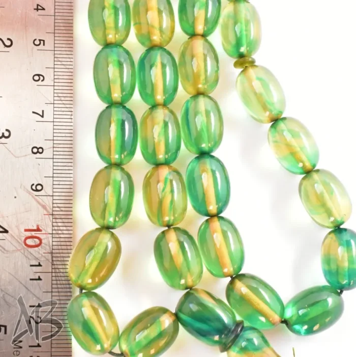 تسبیح کهربای 35 دانه بیضی کشیده رگه‌دار بسیار شکیل کد 1163 آقابزرگ - Image 8