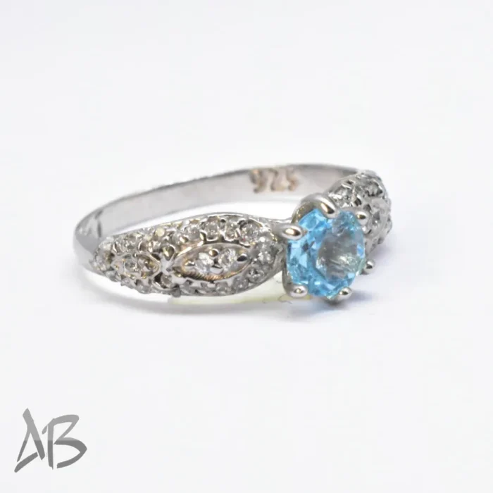 انگشتر نقره زنانه توپاز آبی درخشان و رکاب ظریف و زیبا با پوشش رودیوم کد 373 - Image 7