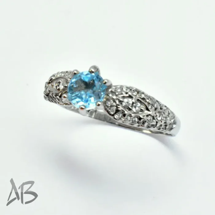 انگشتر نقره زنانه توپاز آبی درخشان و رکاب ظریف و زیبا با پوشش رودیوم کد 373 - Image 8