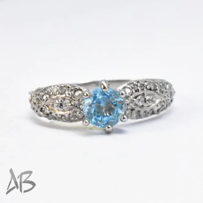 انگشتر نقره زنانه توپاز آبی درخشان و رکاب ظریف و زیبا با پوشش رودیوم کد 373 - Image 10