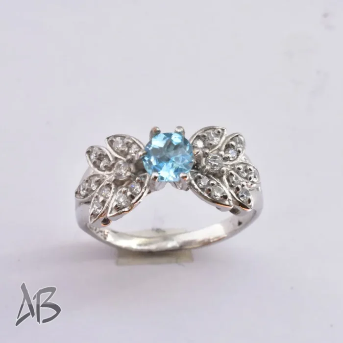 انگشتر نقره زنانه توپاز شفاف و رکاب طرح گلبرگ پرفروش آقابزرگ کد 376 - Image 4