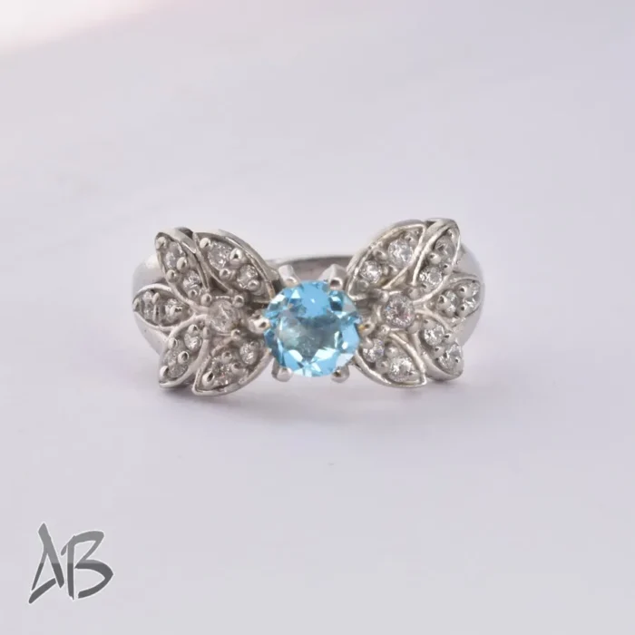 انگشتر نقره زنانه توپاز شفاف و رکاب طرح گلبرگ پرفروش آقابزرگ کد 376 - Image 7