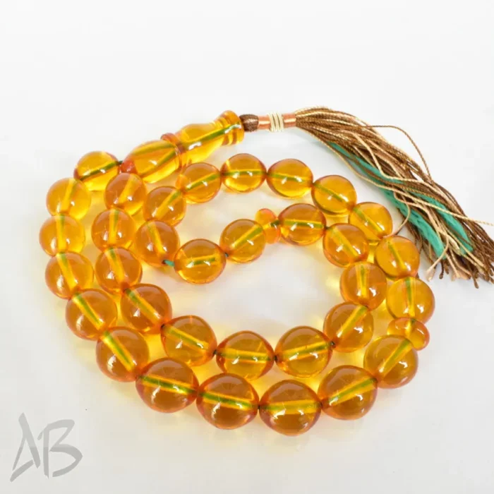 تسبیح سندلوس 33 دانه اصل بودار کد 1248 عسلی سایز 14 در 17 تراش تخم‌مرغی - Image 7