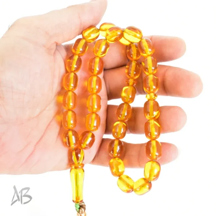 تسبیح سندلوس 33 دانه اصل کد 1276 بودار تراش بیضی زرد رنگ کوتاه و زیبا سایز 10 در 12 - Image 3