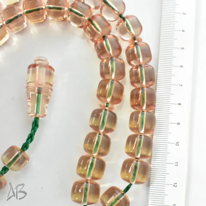 تسبیح سندلوس بودار 33 دانه اصل کد 1299 قپاندار استوانه‌ای لبه گرد عسلی روشن آقابزرگ - Image 4