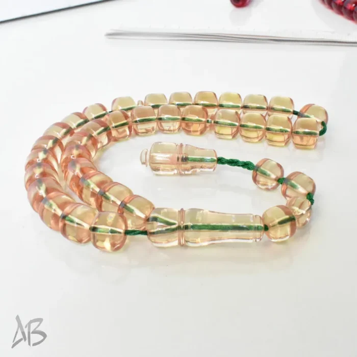 تسبیح سندلوس بودار 33 دانه اصل کد 1299 قپاندار استوانه‌ای لبه گرد عسلی روشن آقابزرگ - Image 8