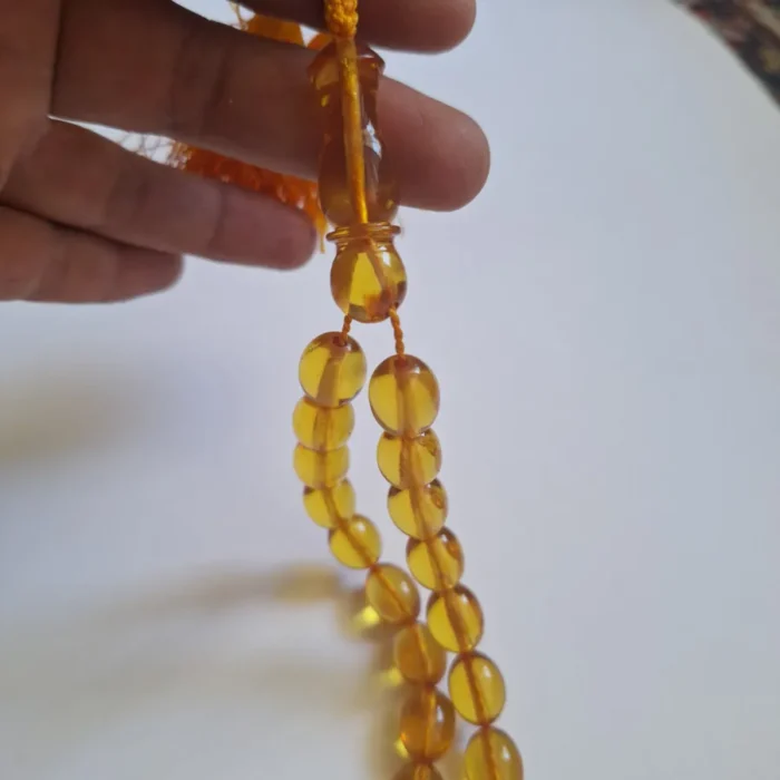 تسبیح سندلوس 33 دانه اصل بودار کد 1365 تخم‌مرغی زرد دو منگوله آقابزرگ - Image 2
